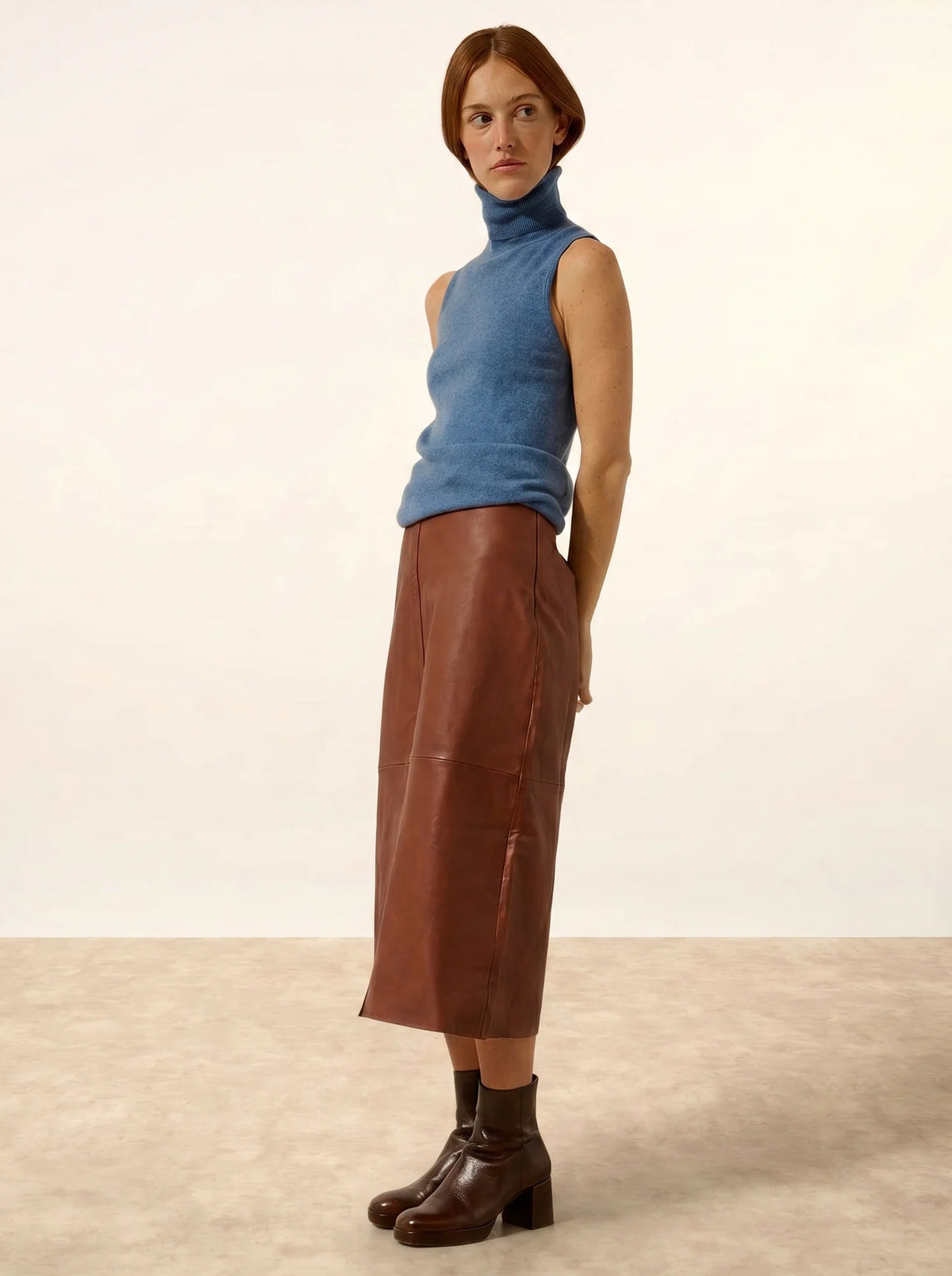 VIOLET Pull Col Roulé sans Manches Bleu Denim